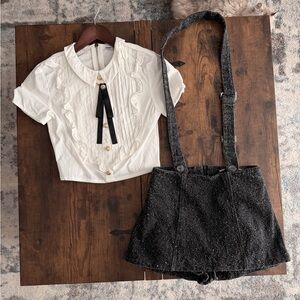 White Ruffled Blouse with Black Skirt